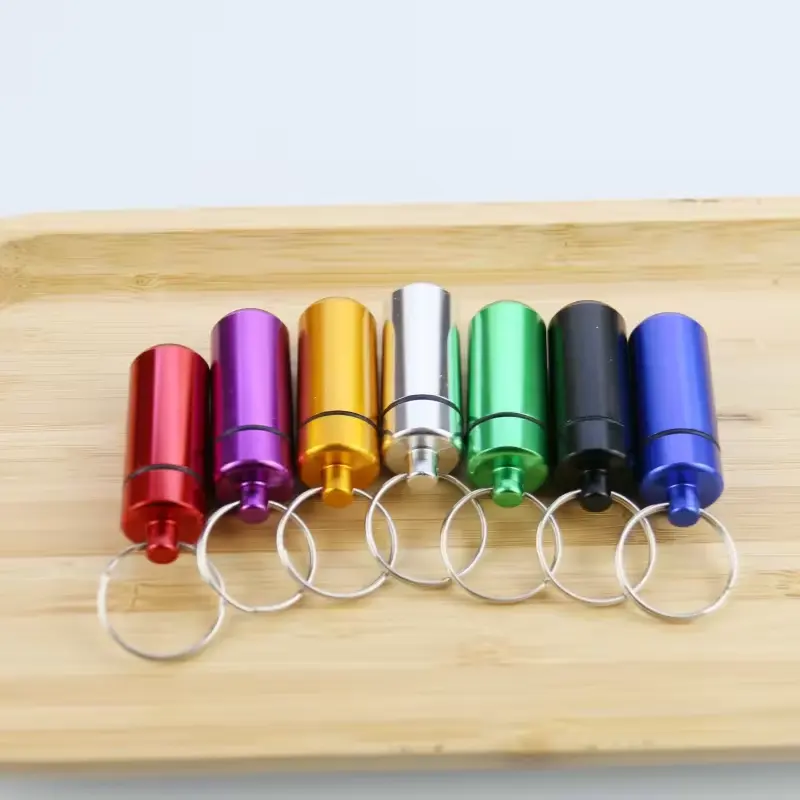Imballaggio in metallo può bottiglie impermeabili sigillate tipo di capsula portatile pillola medicina di stoccaggio con portachiavi
