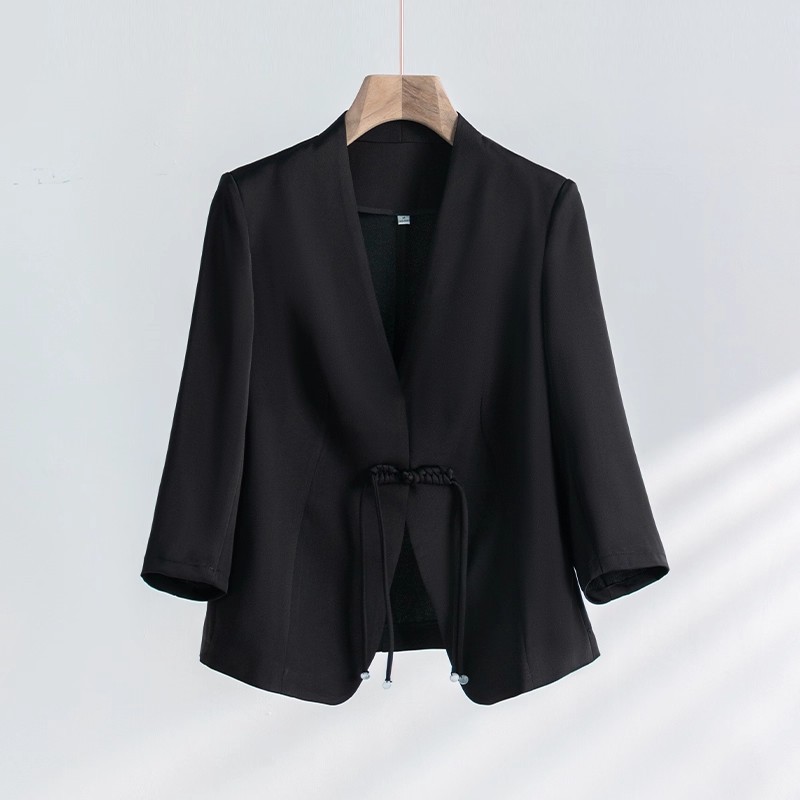 Black suit with Chinese knot buttons