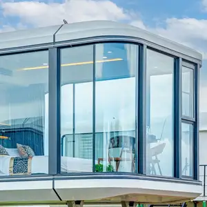 高級モダンプレハブハウス便利なスペースカプセルキャビンモバイルホームステイ観光コンテナプレハブハウスホテル製スチールガラス