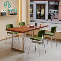 Ensemble de meubles de restaurant et de café Ron Group, chaises en cuir vert modernes et table rectangulaire en bois avec pieds en métal