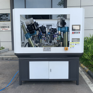 โต๊ะหมุนอเนกประสงค์สำหรับงานเจาะและต๊าปเกลียว พร้อมตู้นิรภัยแบบปิดมิดชิด และระบบป้อนชิ้นงานอัตโนมัติแบบสั่นสะเทือน สำหรับการผลิตชิ้นส่วนโลหะขนาดเล็ก - Product Image 1