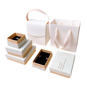 Cubierta de polvo blanco de lujo personalizado embalaje collar anillo pendientes caja de joyería conjunto