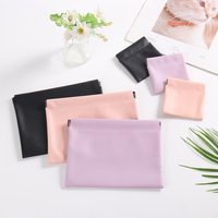 Mini trousse à cosmétiques personnalisée pour rouge à lèvres brillant à lèvres maquillage pochette porte huile liquide pochette petit emballage porte-clés à breloques en cuir PU
