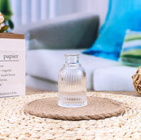 Bouteille en verre transparente simple de 90 ml à surface rayée pour diffuseur de parfum à bâtonnets, idéale pour la maison et l'hôtel