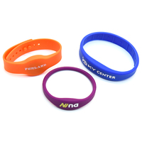 Bracelet/Bracelet en Silicone NFC réglable 13,56 MHz RFID personnalisé avec puce 1k Ntag213 pour le paiement des sports et des hôtels