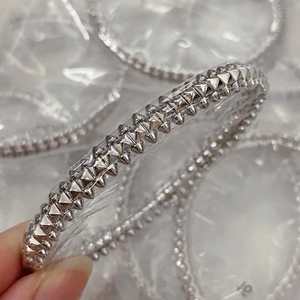 Bracciale Clash De Kardia Placcato Oro 18K con Borchie, Perle Rotonde e Borchie Quadrate - Gioiello dal Design Eccezionale - Product Image 5