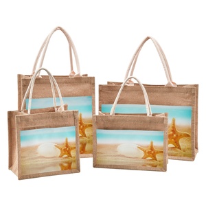 Sacs de plage en paille à bas prix pour la vente en gros, sacs de shopping imperméables personnalisés avec imprimé Puakenikeni - Product Image 1
