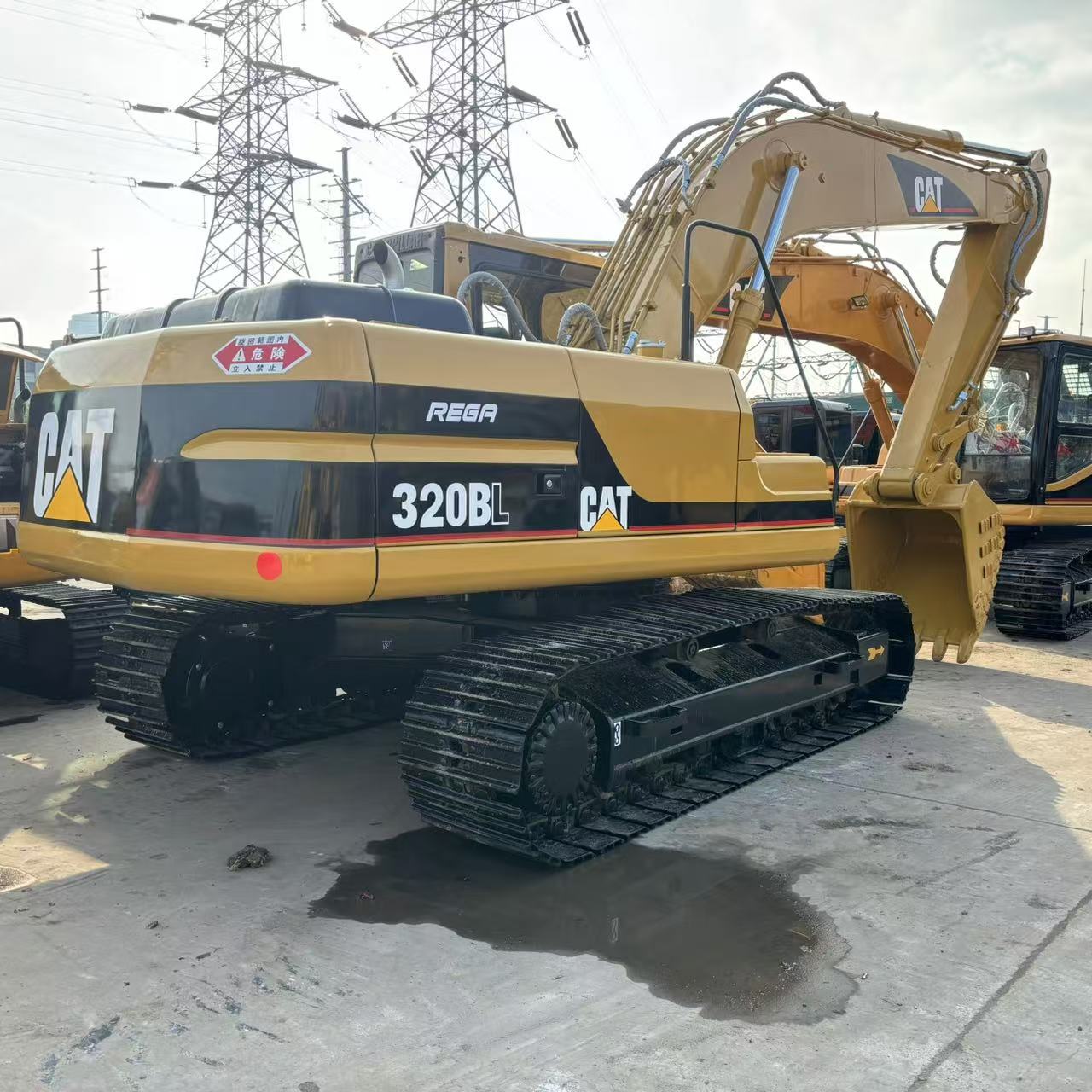 Экскаваторы Cat 320BL