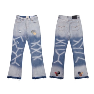 Jeans unisexe vintage <span class=keywords><strong>déchiré</strong></span> coupe évasée <span class=keywords><strong>en</strong></span> denim délavé avec imprimé X pour <span class=keywords><strong>homme</strong></span> et femme, style streetwear, pantalon patte d'éléphant - Product Image 1