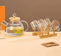 Vaisselle en verre transparente classique, comprenant une théière en verre lisse de luxe, 6 tasses et un porte-tasses en bois