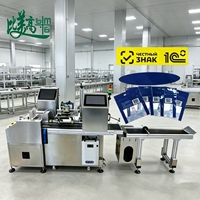 Machine de marquage laser en ligne haute vitesse pour le codage par positionnement visuel et la vérification de la conformité du contenu de marquage