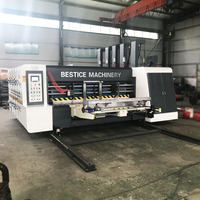 Mesin Pencetak Flexo Slotter Die Cutter Otomatis untuk Karton Bergelombang dengan Sistem Pengumpanan Tepi Otomatis dan Tinta Berbasis Air untuk Kotak Karton