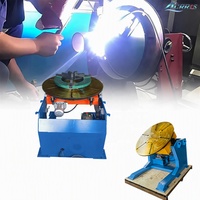 Positionneurs de soudage rotatifs automatiques inclinables et pivotants de 1200 kg pour le levage, l'inclinaison et la rotation des pièces.