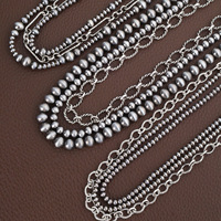 Colliers pendentifs géométriques en plastique perlé style vintage occidental pour femmes, chaînes bohèmes multicouches décontractées, bijoux de mode