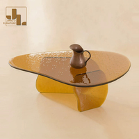 Table basse de luxe en verre de forme irrégulière marron pour salon de villa au design créatif, idéale pour chambre d'hôtel