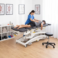 Table de chiropratique électrique de luxe |   Lit de décompression vertébrale à sections réglables en 3D, inclinaison électrique, capacité de charge de 150 kg
