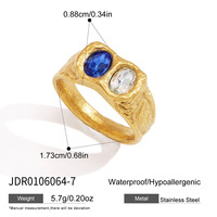 PVD-Beschichtung Klassischer 18K Gold Edelstahl Weiß-Blauer Ovaler Strass Sandgold Strukturierter Leicht Gehämmerter Zirkon-Ring