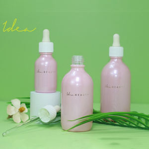 Bouteille compte-gouttes en verre de 50 ml avec tête de pompe à émulsion et impression à chaud dégradée bleue à paillettes, vente en gros sur mesure en usine - Product Image 3