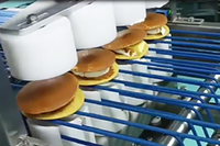 Ligne de production Dorayaki Il applique automatiquement le refroidissement Flips Dépôts Remplissage Timbres les produits et les sceaux et autres processus