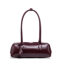 Vente en gros usine : Sac de mode tendance, sac à longue anse, sac rétro de niche, sac porté épaule, sac à main pour femme, sac coussin