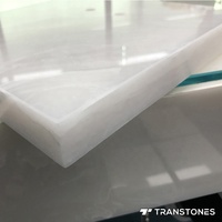 Comptoir en albâtre blanc poli de taille personnalisée en pierre d'onyx translucide