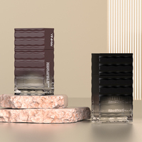Flacon de parfum 50 ml Yinmai OEM, design d'usine, luxe, carré, pulvérisateur à pompe sérigraphié, motif vague marine