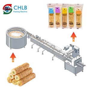 Unité de conditionnement Barre protéinée Barres de riz Rouleau d'oeufs alimentation rotative ligne de conditionnement flux automatique machine - Product Image 3