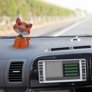 Le chat bobblehead de luxe orange est un animal mignon et ludique, parfait pour votre tableau de bord de voiture, votre bureau ou votre décoration intérieure. - Product Image 1