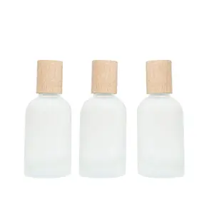 Vietnam Manufacturer Wholesale Luxury 50ml 100ml Wooden Lid Caps Glass Empty Small Perfume Bottles