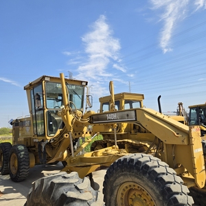 Niveleuse sur pneus CAT 140H d'occasion, peinture d'origine, fabriquée aux États-Unis, niveleuse Caterpillar 140G 140H d'occasion à prix d'usine - Product Image 1