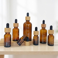 Flacon compte-gouttes d'huile essentielle en verre transparent de 10 ml pour huile essentielle d'arbre à thé, avec bouchon, vente en gros Chine