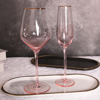 Verre à vin en cristal rose soufflé à la main avec bord doré, approvisionnement en vrac auprès d'un fabricant chinois de verrerie pour vin rouge et champagne