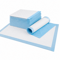 Tapis absorbants bleus OEM pour chiens, surface non tissée douce, support imperméable en PE pour chiots et chiens âgés