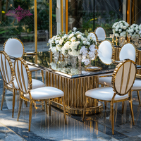 Table de salle à manger de luxe durable en or moderne pour hôtel et mariage avec structure en acier inoxydable et plateau en verre miroir