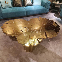Table basse de luxe moderne haut de gamme Sculpture miroir doré Table basse de salon en acier inoxydable pour villa