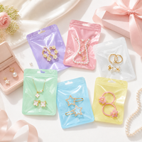 100 pièces/sac Sachets holographiques en Mylar à fermeture éclair pour bijoux, poudres, aliments secs, noix, bonbons, emballage irisé