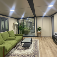 Maison extérieure préfabriquée modulaire portable pliable extensible en acier contemporain de 20 pieds et 40 pieds, avec isolation thermique et imperméable