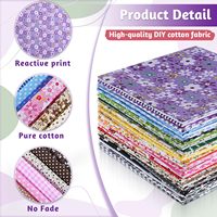Paquete de cuadrados de tela de algodón acolchada estampada multicolor precortados para manualidades de costura y patchwork.