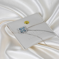 Pochette à bijoux en cuir PU avec bouton pression, portable, 8*8cm, sac de rangement pour bijoux