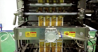 Machine à emballer à plusieurs voies de remplissage de liquide de sachet à grande vitesse pour l'emballage de sauce au miel de ketchup de pâte de tomate de shampooing