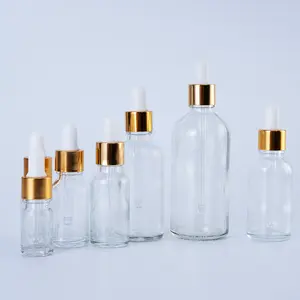 Botella de vidrio transparente para cosméticos, tapón de aluminio dorado de 5ml, 10ml, 20ml, 50ml, 60ml, 100ml