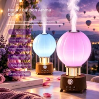 Nouveau Diffuseur d'Arômes Montgolfière à Air Chaud, Lumière Ambiante 7 Couleurs, Humidificateur d'Huiles Essentielles avec Haut-parleur, Bruit Blanc et Télécommande