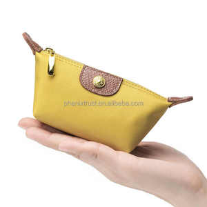 High Quality Waterproof <strong>Nylon</strong> &amp; <strong>Genuine</strong> Leather Characters Pattern Zipper Closure Fashion Cosmetic Bag and Case - Product Image 1