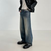 Jean pour homme à encolure arrière effilochée, détails de coutures usées, coupe skinny, style grunge, en gros