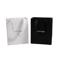 Sacs en papier d'art de luxe personnalisés pour vêtements, bijoux et artisanat utilisés dans des emballages de luxe à texture épaisse avec logo personnalisé