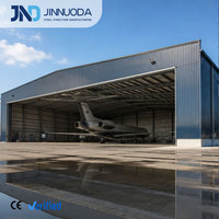 Hangar d'avion préfabriqué en acier homologué CE, toiture en tôle ondulée, portée libre 30M, service d'ingénierie professionnel