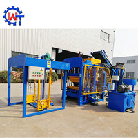 Machine de fabrication de blocs de béton entièrement automatique QT4-15, machine de fabrication de briques creuses en ciment