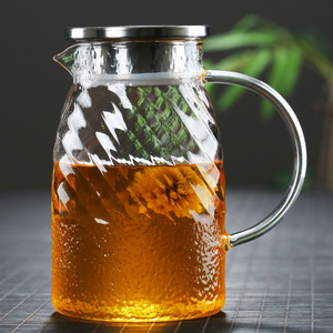 Pichet en verre à haute teneur en borosilicate 40 ans en usine Pichet à eau froide <span class=keywords><strong>Carafe</strong></span> en verre style grain ondulé Capacité de 1100ml - Product Image 2