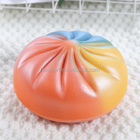 2025 Promotion en gros arc-en-ciel en peluche chignon alimentaire Squishy doux modèle jouet PU Squishy lent rebond jouets