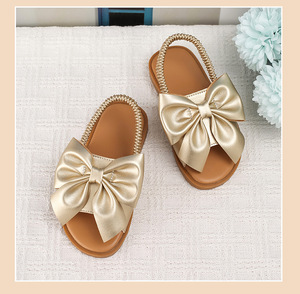 Sandales d'été pour enfants, nouveau style, chaussures de marche ajourées, sandales plates dorées avec nœuds et sangles élastiques - Product Image 2